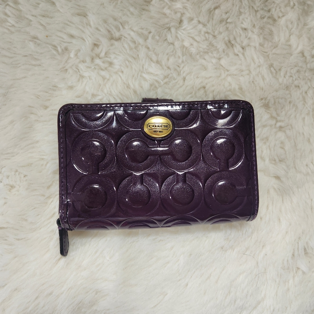 Coach Peyton Op Art Embossed Patent Leather Compact Wallet Dark Merlot Purple